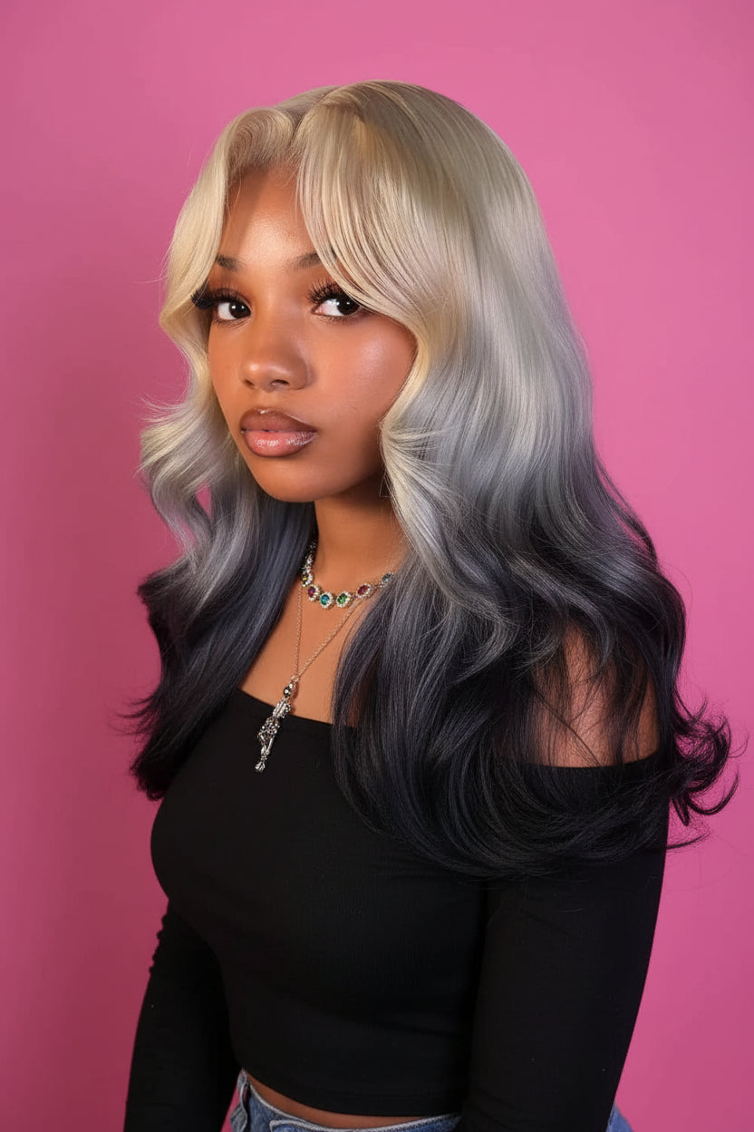 Person with styled hair in a salon setting, wearing a camouflage jacket.Blonde grey body wave wig