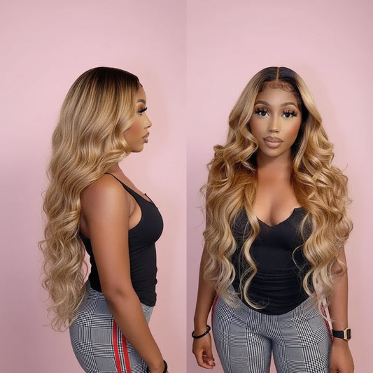 Woman with long blonde wavy hair wearing a black top and plaid pants.